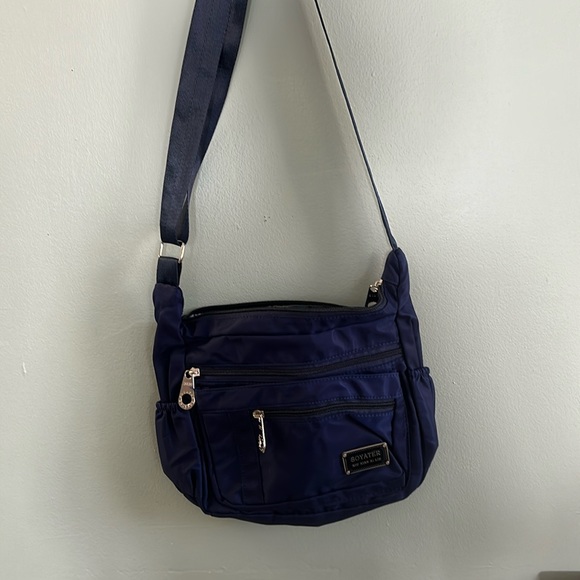 Soyater Crossbody bag NWOT in excellent condition with so many pockets (10) - Picture 1 of 5